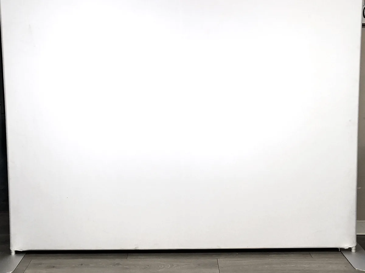 Ivory white tension-fabric backdrop
